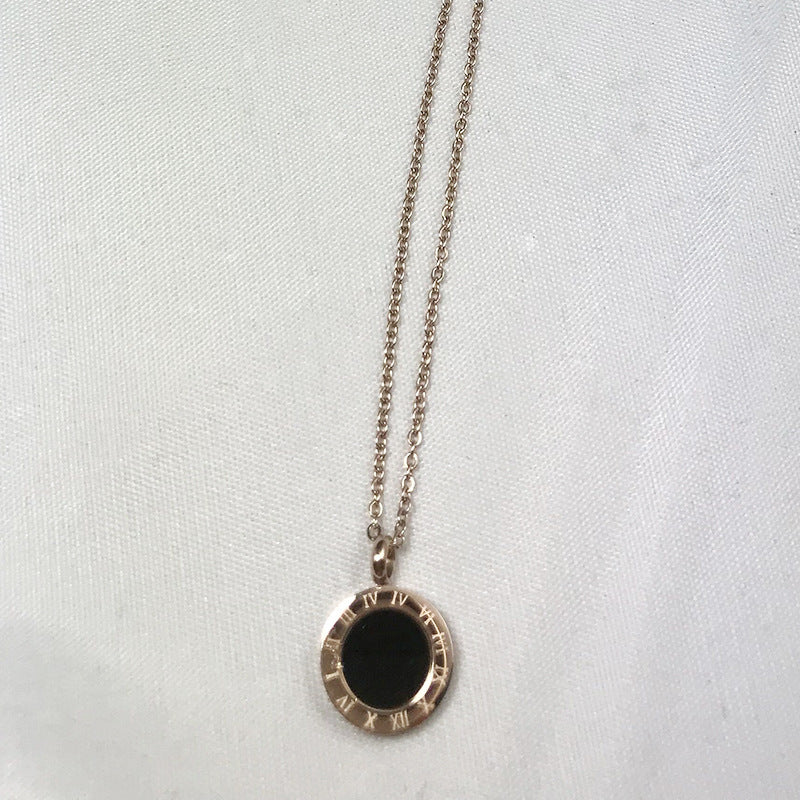 Timeless black shell Roman pendant for any occasion.