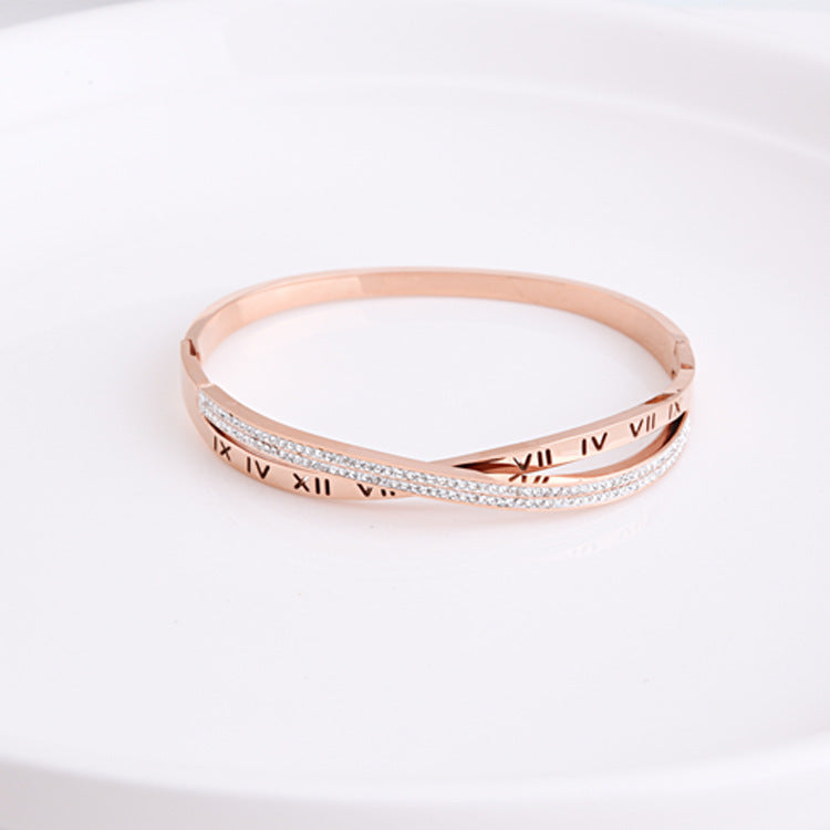 Roman word design adds a touch of elegance to this bracelet.