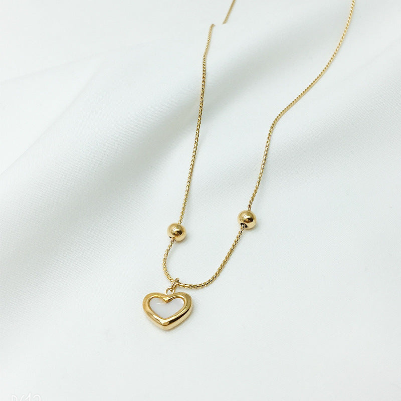 Romantic peach heart design adds a delicate touch.