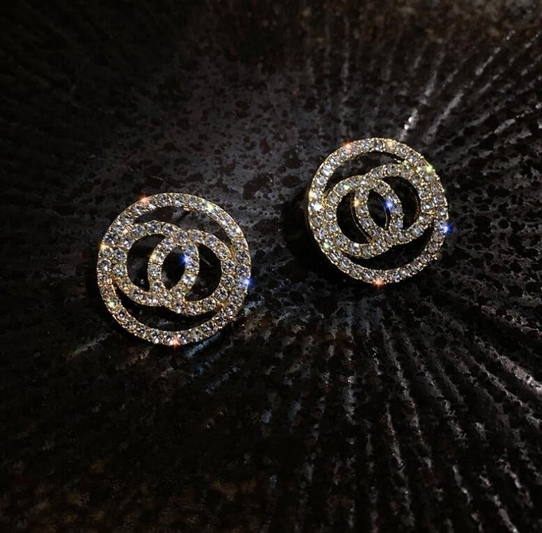 Electroplated alloy earrings in gold and silver finishes.