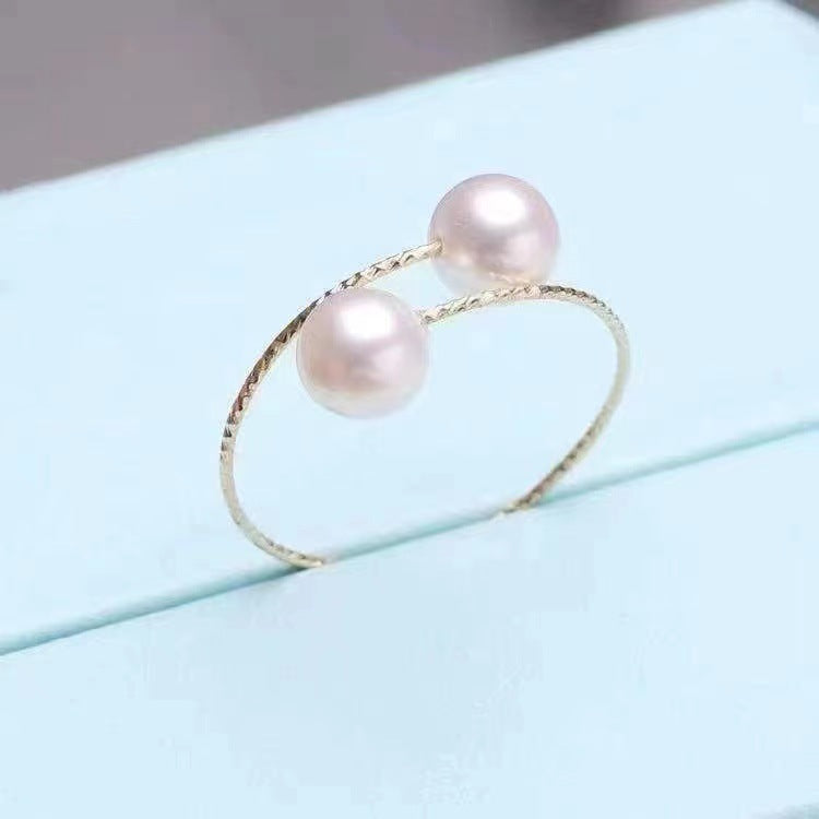 18K Gold au750 jewelry with a modern design and white pearl