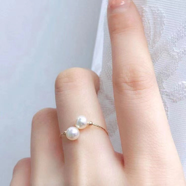 18K Gold ring with pearl inlay, ideal for sophisticated women