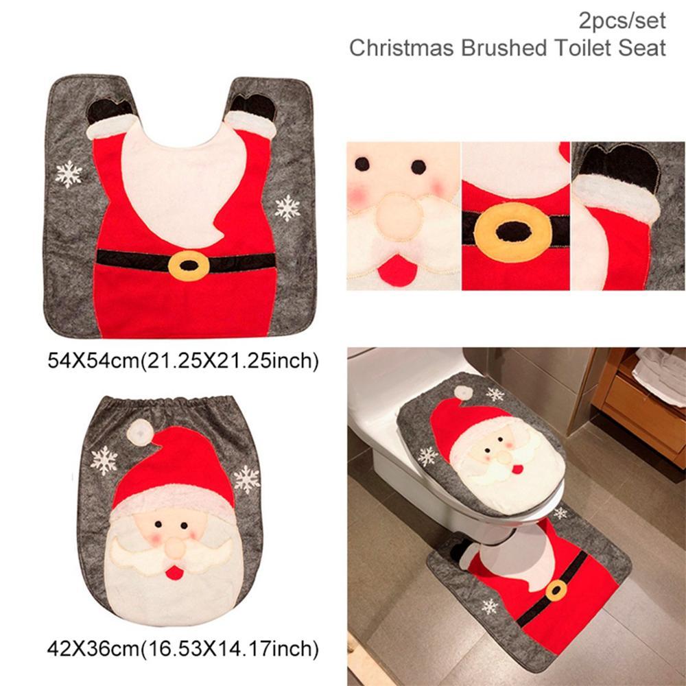 Christmas bathroom decor set with Santa Claus and festive accessories.