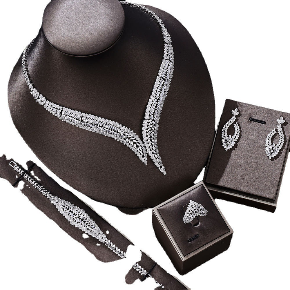 Stunning luxury jewelry set with snowflake, elk, and Santa Claus.