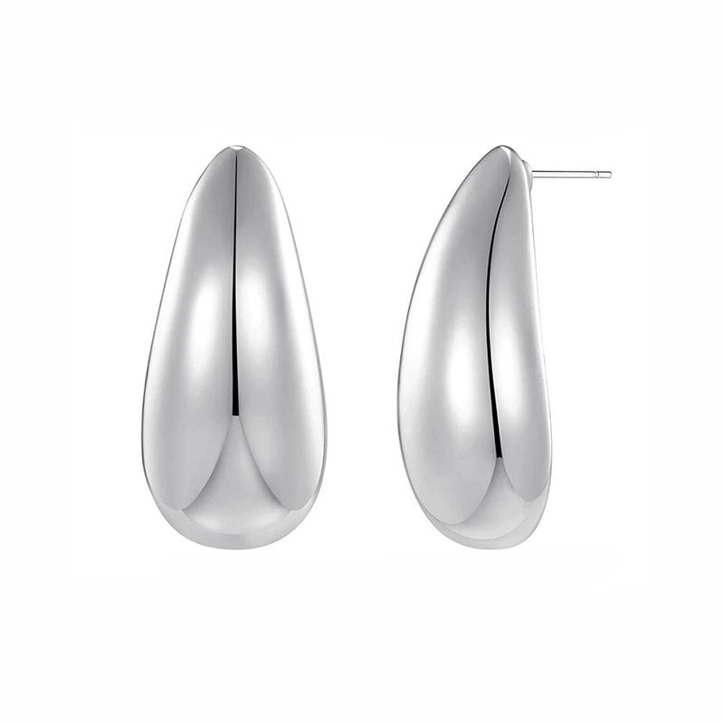 Enhance your look with these luxurious tear drop earrings in gold or silver.